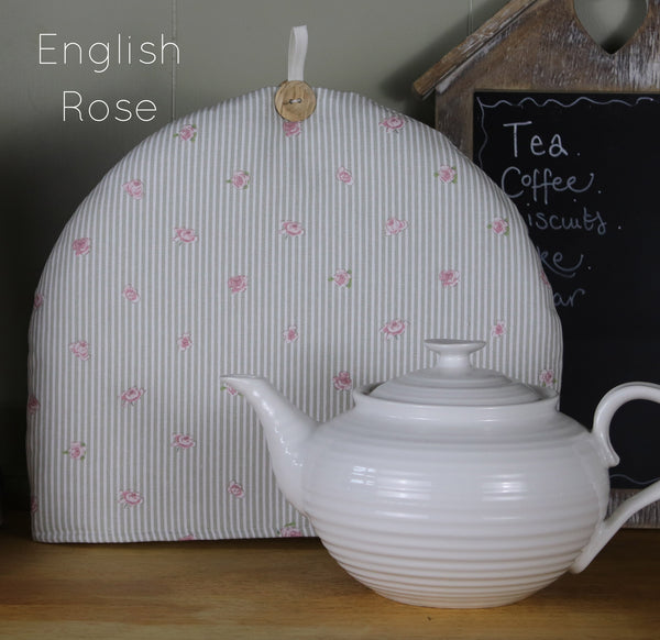 Sophie Allport tea cosy. Handmade by Harris and Home in animal print dog bees and birds fabric