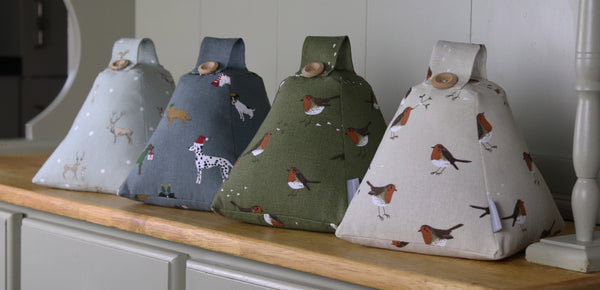 Christmas door stop. Handmade in Sophie Allport Christmas fabrics. Robin and Mistletoe, Christmas Stags Reindeer fabric.