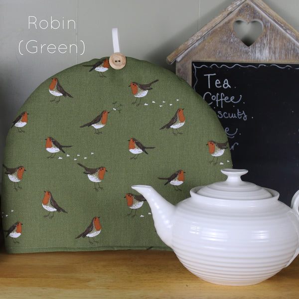 Christmas tea cosy. Handmade in Sophie Allport Christmas Fabrics. Robin and Mistletoe, Christmas dogs, Christmas Stags Reindeer fabric.