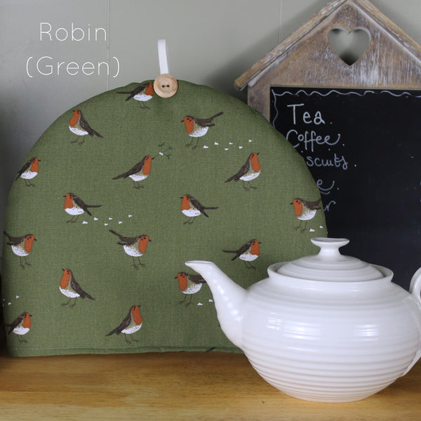 Sophie Allport tea cosy. Handmade by Harris and Home in animal print dog bees and birds fabric