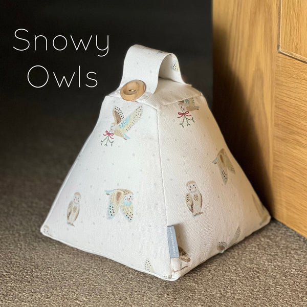 Christmas door stop. Handmade in Sophie Allport Christmas fabrics. Robin and Mistletoe, Christmas Stags Reindeer fabric.