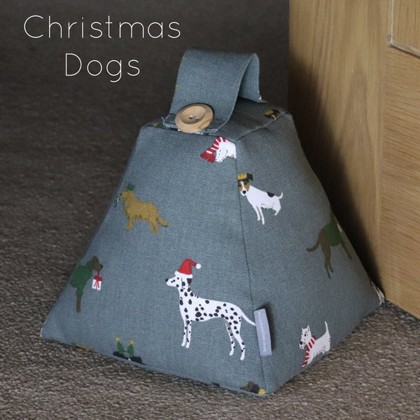 Christmas door stop. Handmade in Sophie Allport Christmas fabrics. Robin and Mistletoe, Christmas Stags Reindeer fabric.