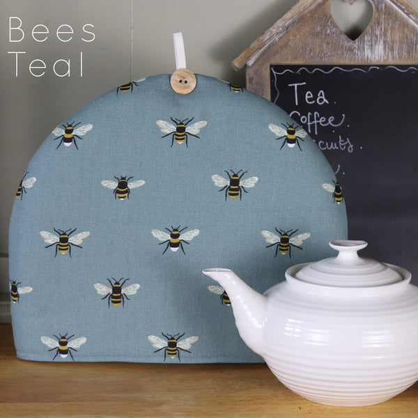 Sophie Allport tea cosy. Handmade by Harris and Home in animal print dog bees and birds fabric