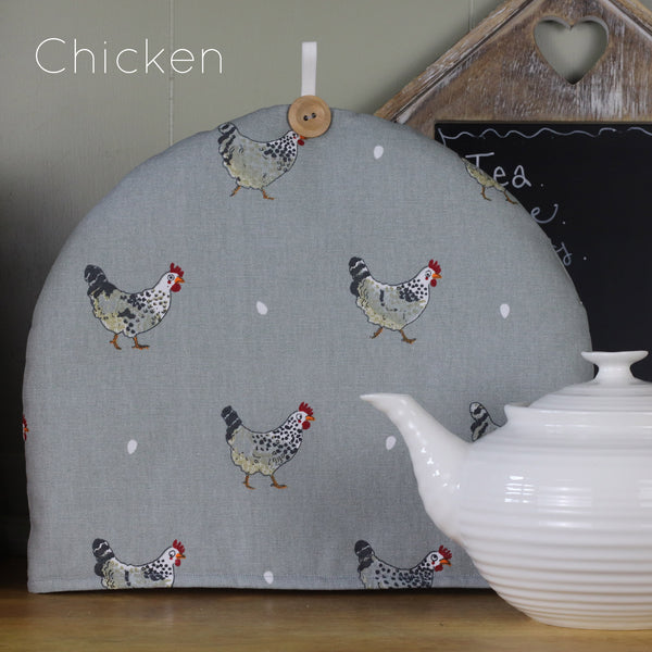 Sophie Allport tea cosy. Handmade by Harris and Home in animal print dog bees and birds fabric