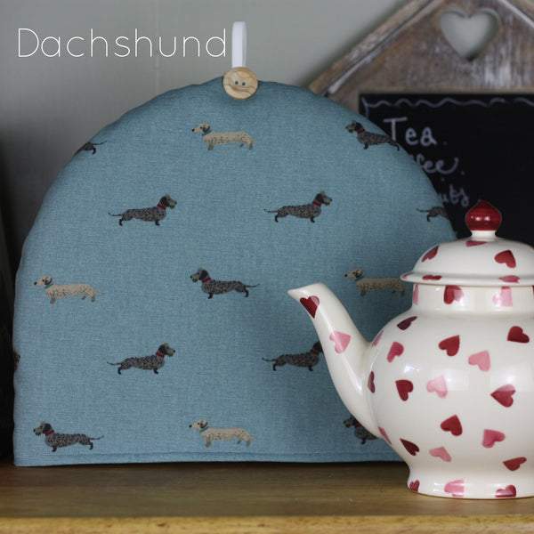 Sophie Allport tea cosy in dog fabrics. Handmade by Harris and Home in Labrador Terrier Pug Spaniels Dachshund Fabric
