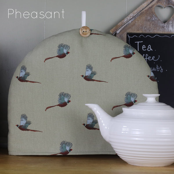 Sophie Allport tea cosy. Handmade by Harris and Home in animal print dog bees and birds fabric