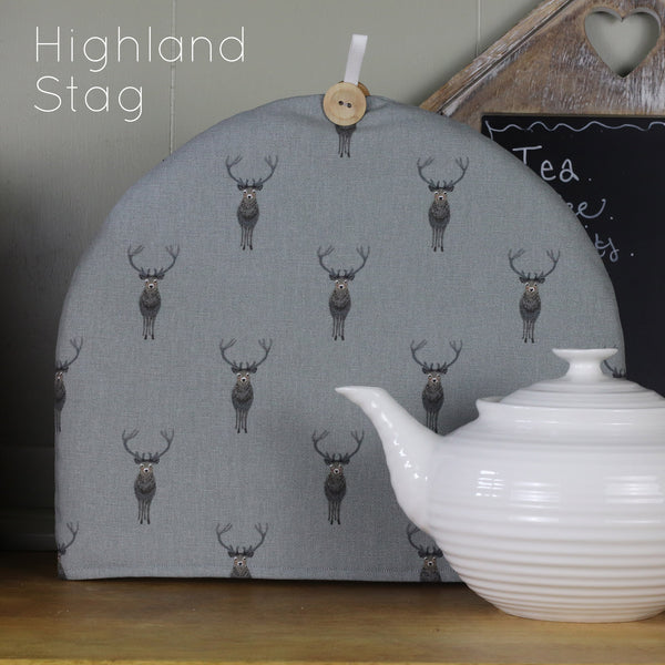 Sophie Allport tea cosy. Handmade by Harris and Home in animal print dog bees and birds fabric